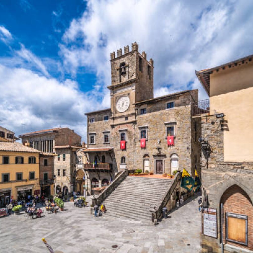 Main square with the old city hall in Cortona, Tuscany, Italy