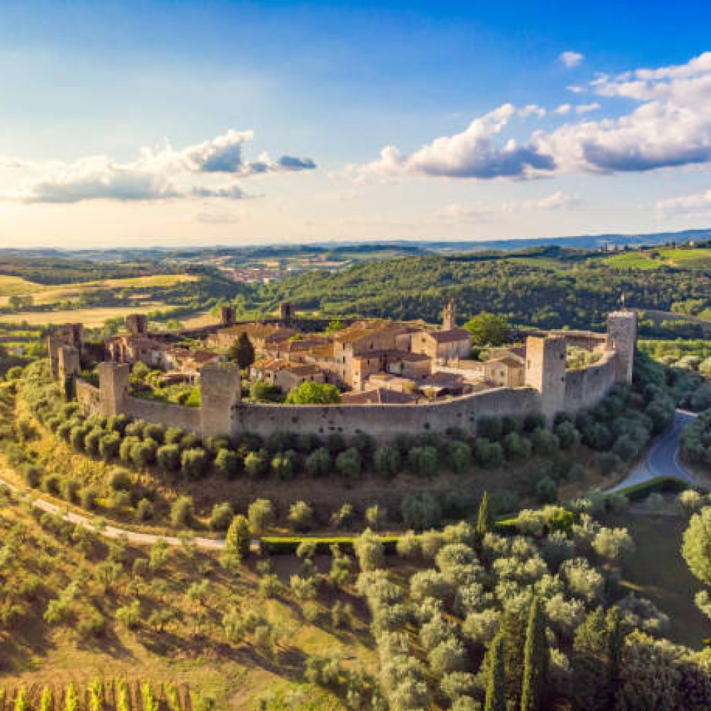 Drone view of Monteriggioni fort town in Tuscany, Italy